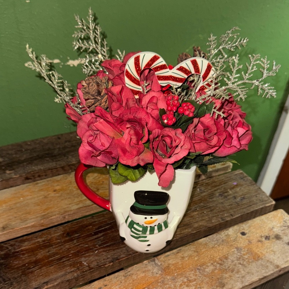 Festive Snowman Mug with Red Floral Arrangement